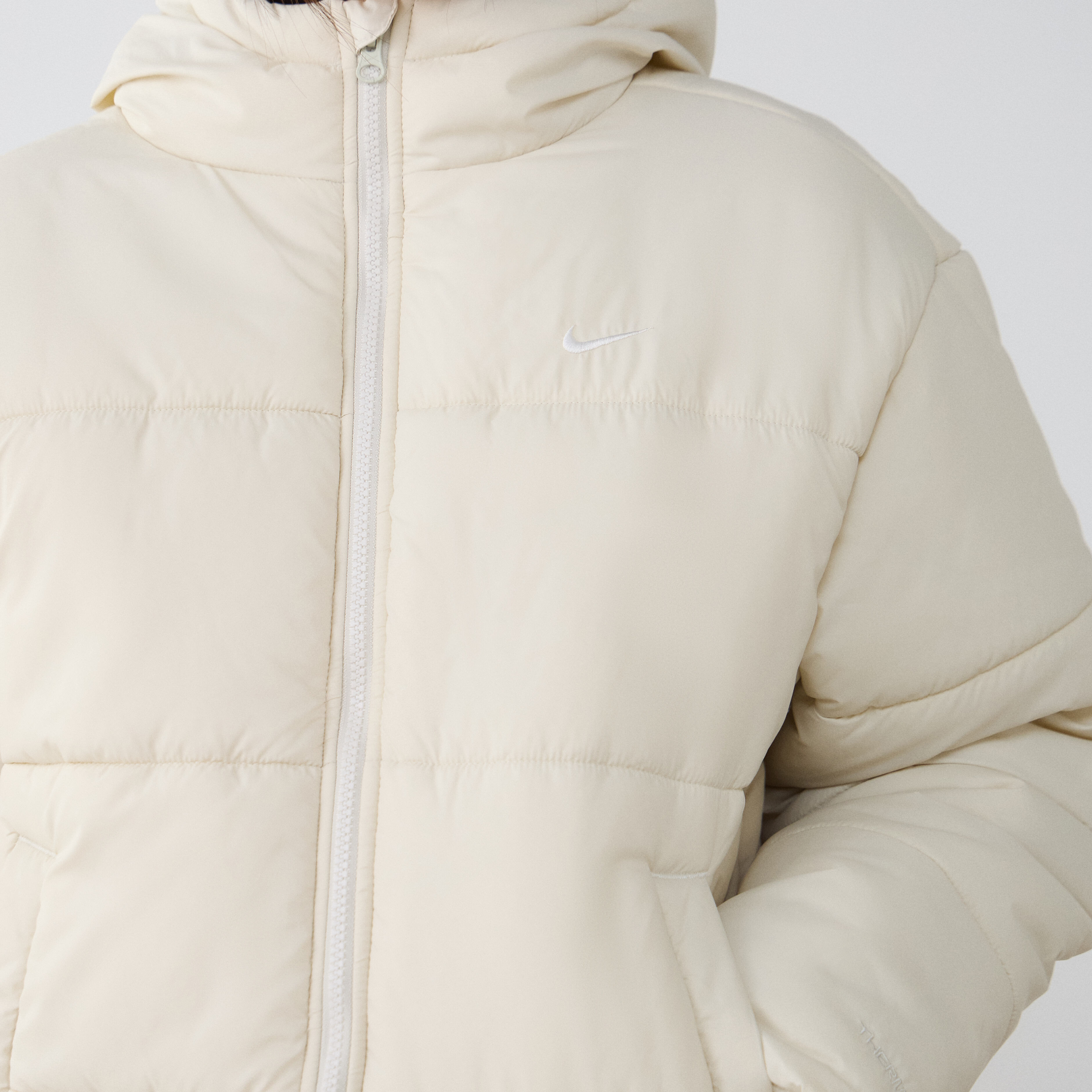 cream nike puffer