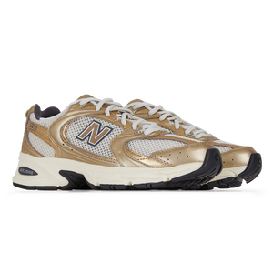 New balance doré shop femme
