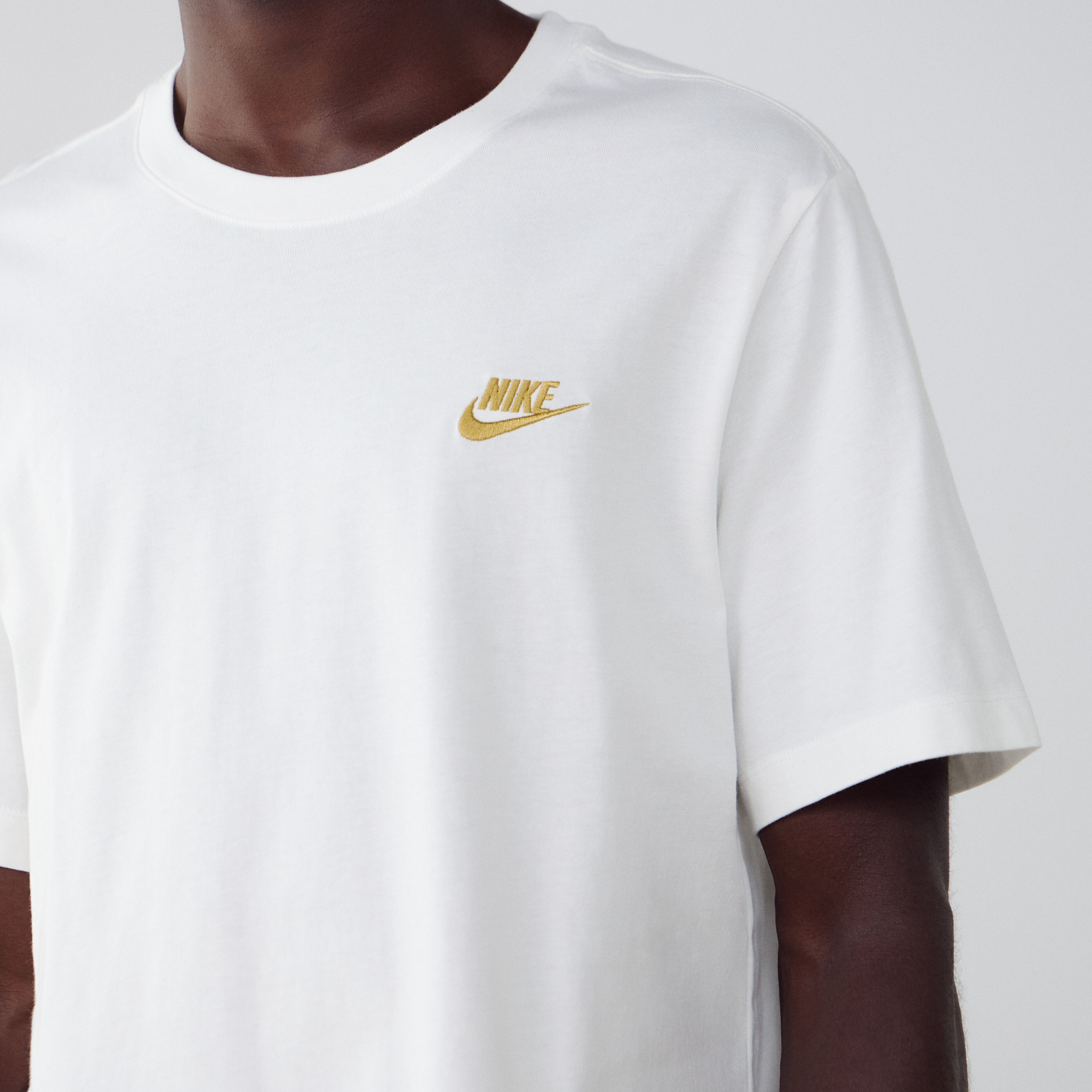nike gold swoosh shirt