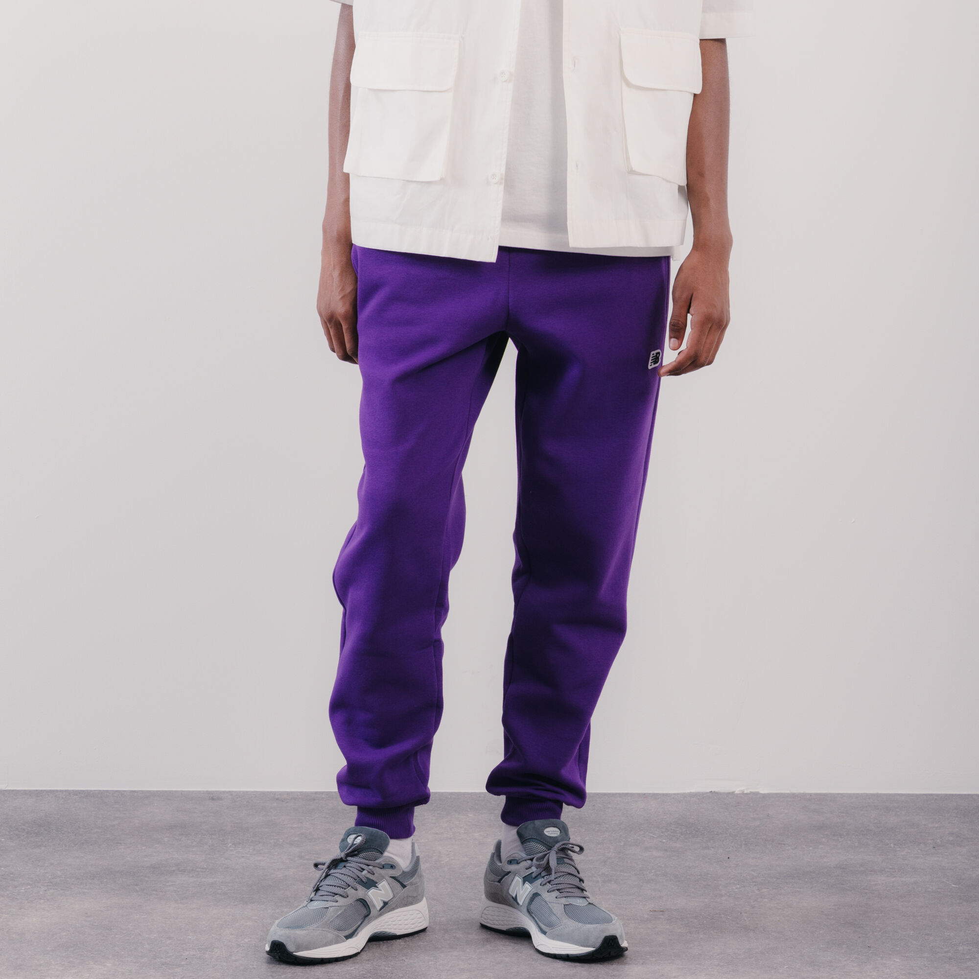 NEW BALANCE PANT JOGGER SMALL LOGO VIOLET PANTALON HOMME Courir