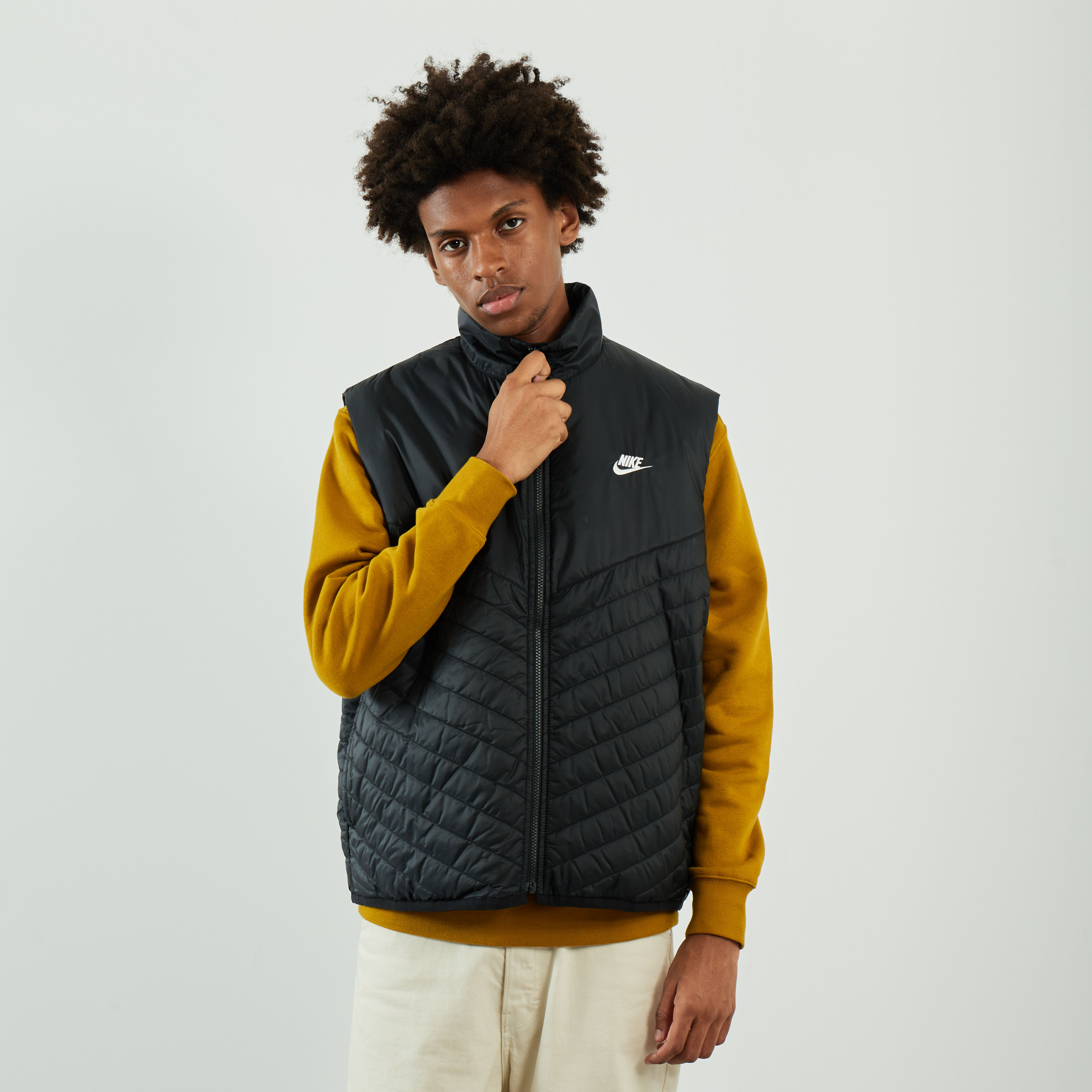 NIKE SLEEVELESS PUFFER JACKET BLACK BEIGE JACKETS MEN Courir
