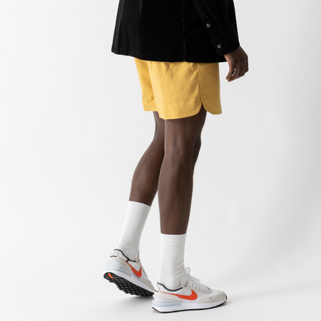 NIKE SHORT WOVEN FLOW JAUNE HOMME
