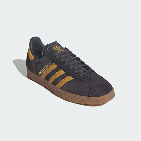 ADIDAS PERFORMANCE Chaussures Gazelle Manchester United Utility Black / Preloved Yellow / Gum MIXTE