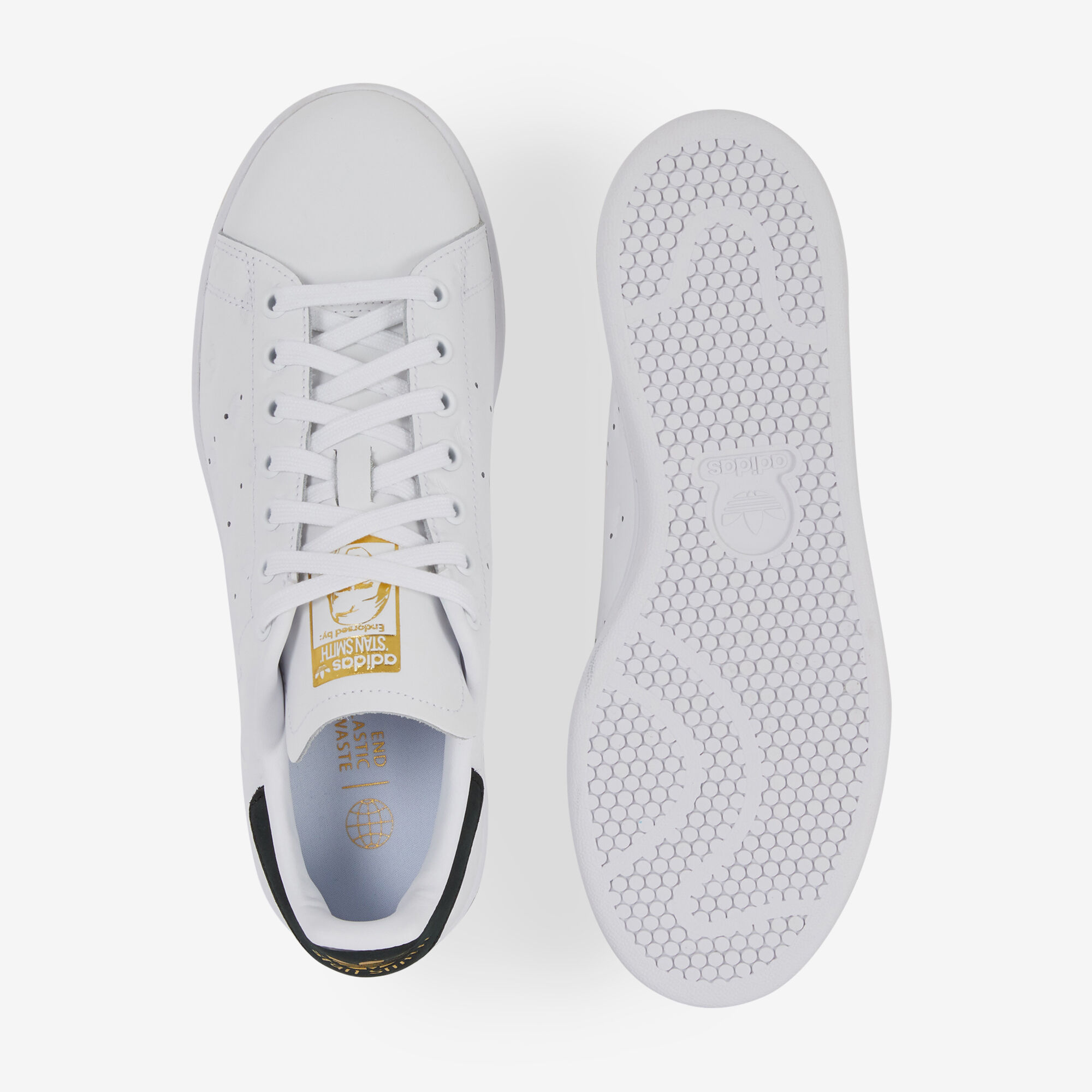 Stan smith noir courir online