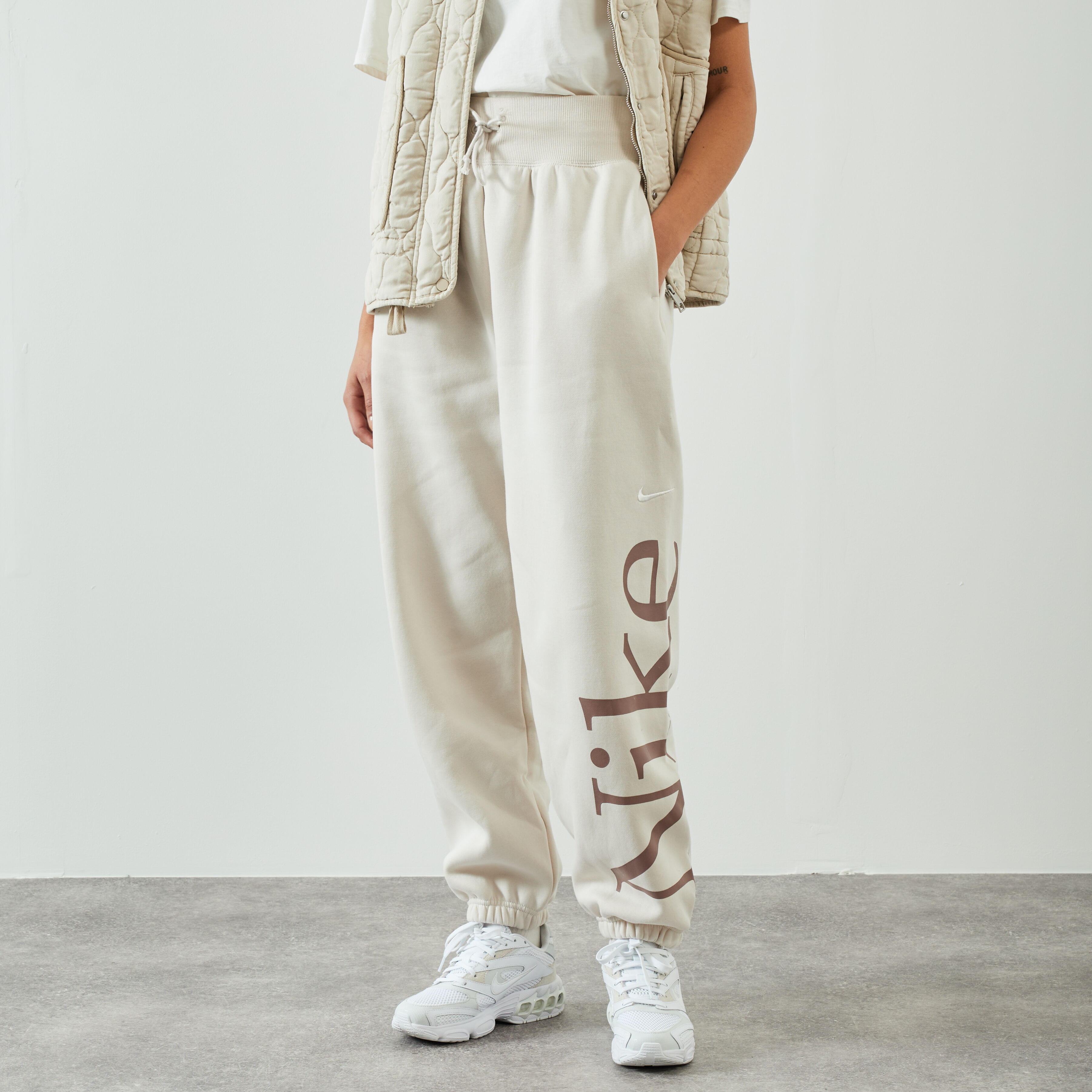 Pantalon nike femme beige shop