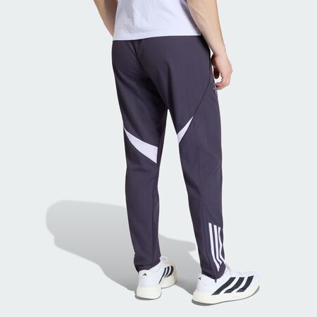 ADIDAS PERFORMANCE Pantalon de pr&eacute;sentation Manchester United Tiro 25 Competition Aurora Black / Purple Tint HOMME