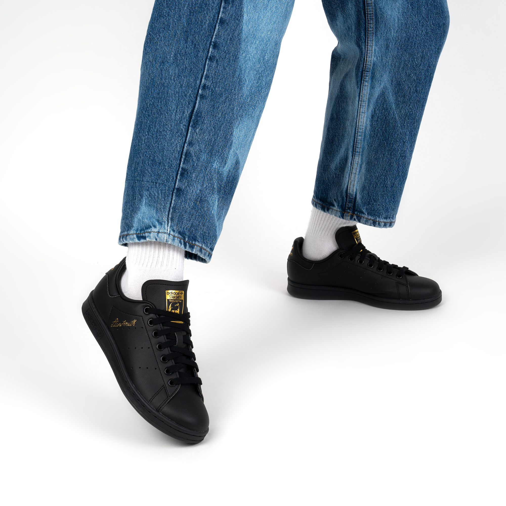 stan smith noir courir