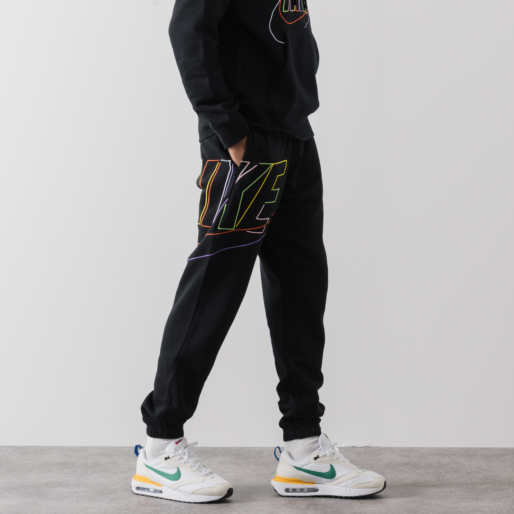 Nike swoosh joggers black and 2025 red