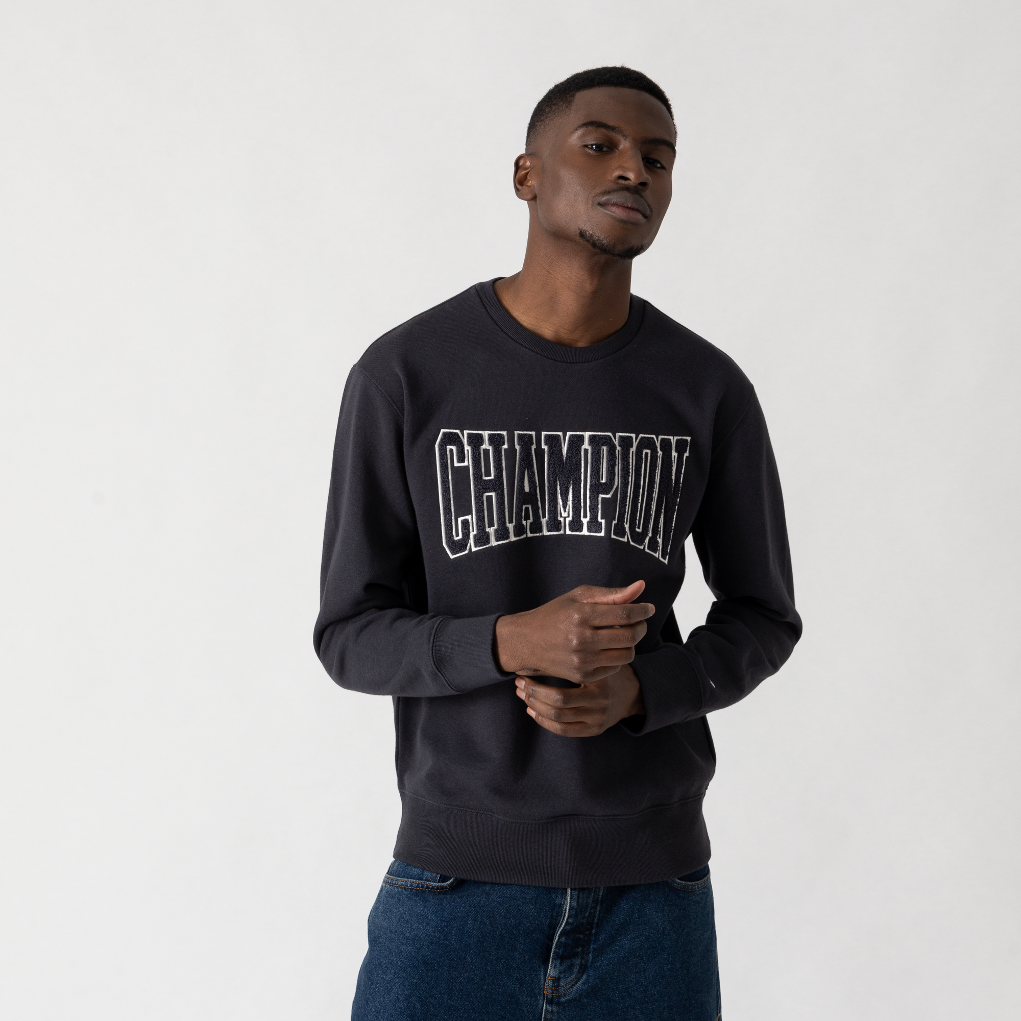 Champion sweater black sale and white jeans